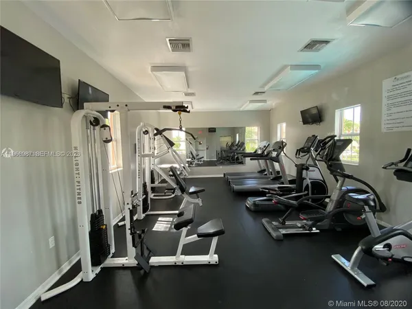 a view of a room with gym equipment