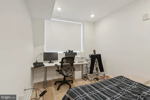 a view of workspace with wooden floor