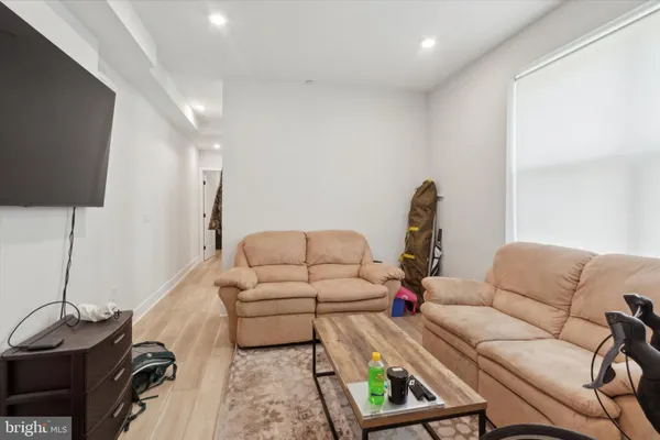 a living room with furniture and a couch