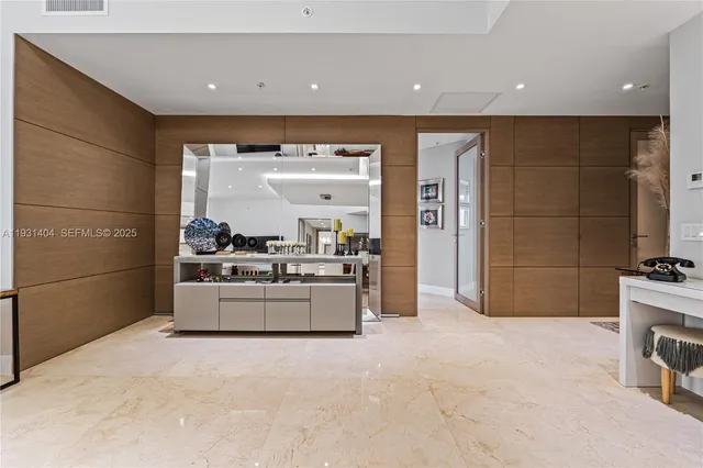 a large white building with kitchen view