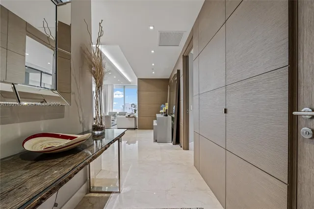 a lobby with furniture and window