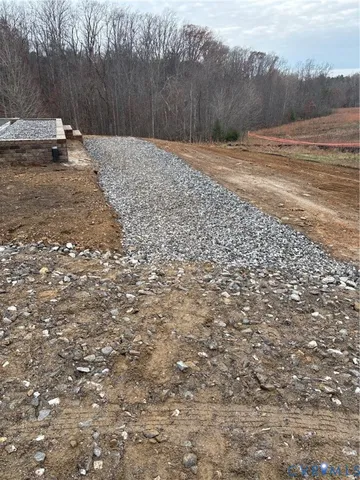 a view of backyard with green space