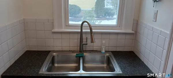 a bathroom with a glass door