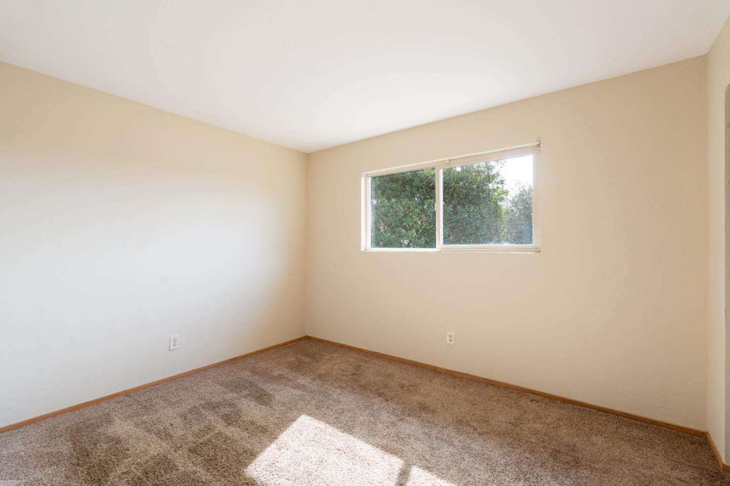 301 Park Circle Marina, CA 93933 - Photo 12 of 18 an empty room with a window