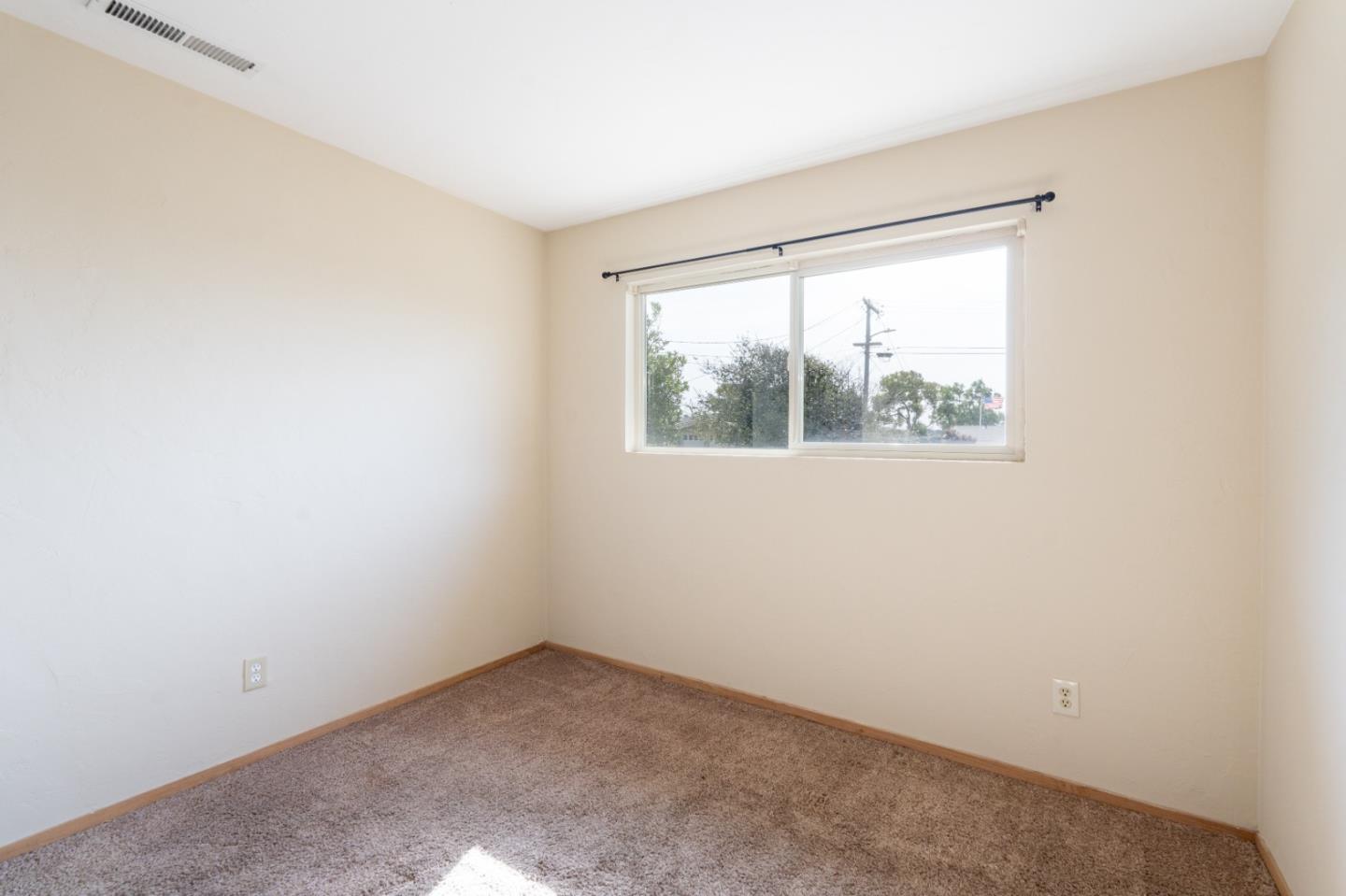 301 Park Circle Marina, CA 93933 - Photo 15 of 18 an empty room with a window