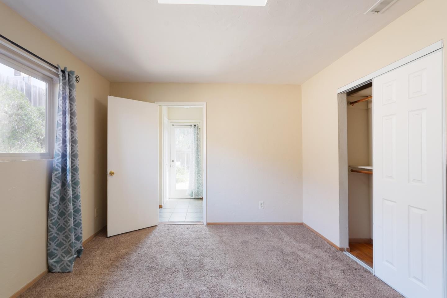 301 Park Circle Marina, CA 93933 - Photo 10 of 18 a view of an empty room with a window