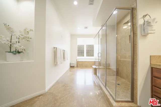 an aerial view of a house with a garden