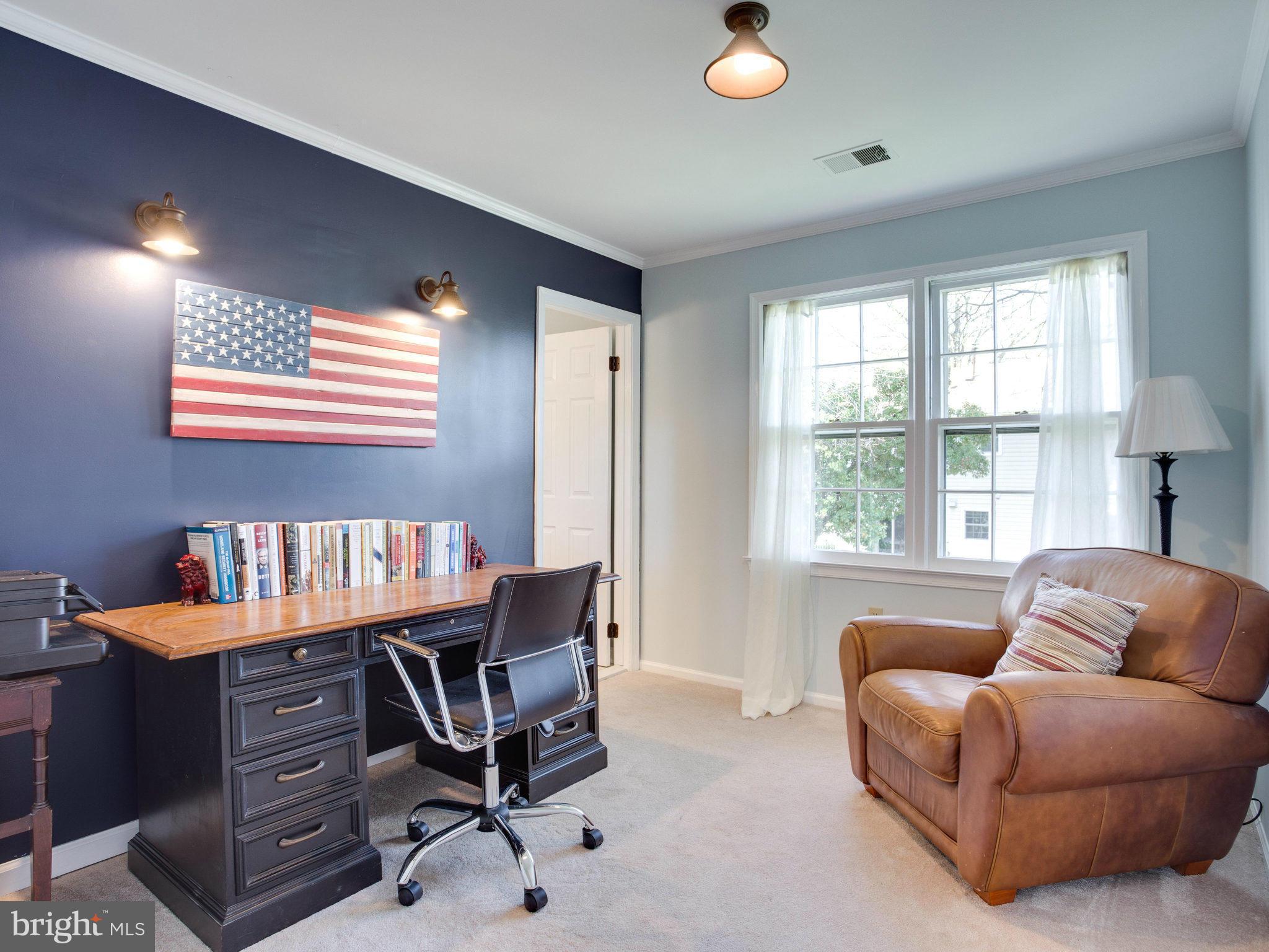 8231 Crown Court Road Alexandria, VA 22308 - Photo 18 of 30 a living room with furniture and a window