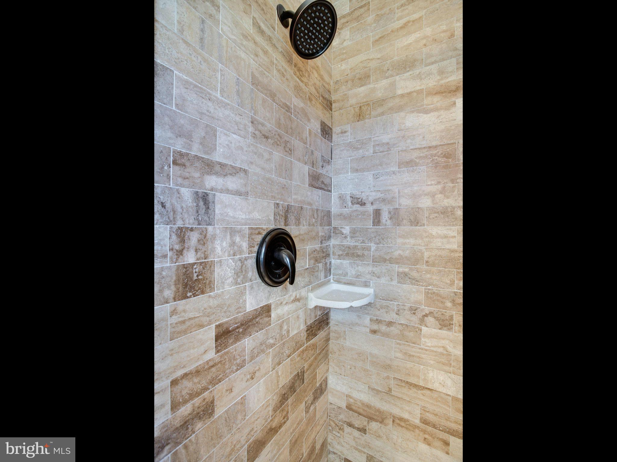 8231 Crown Court Road Alexandria, VA 22308 - Photo 20 of 30 a bathroom with a sink and a shower