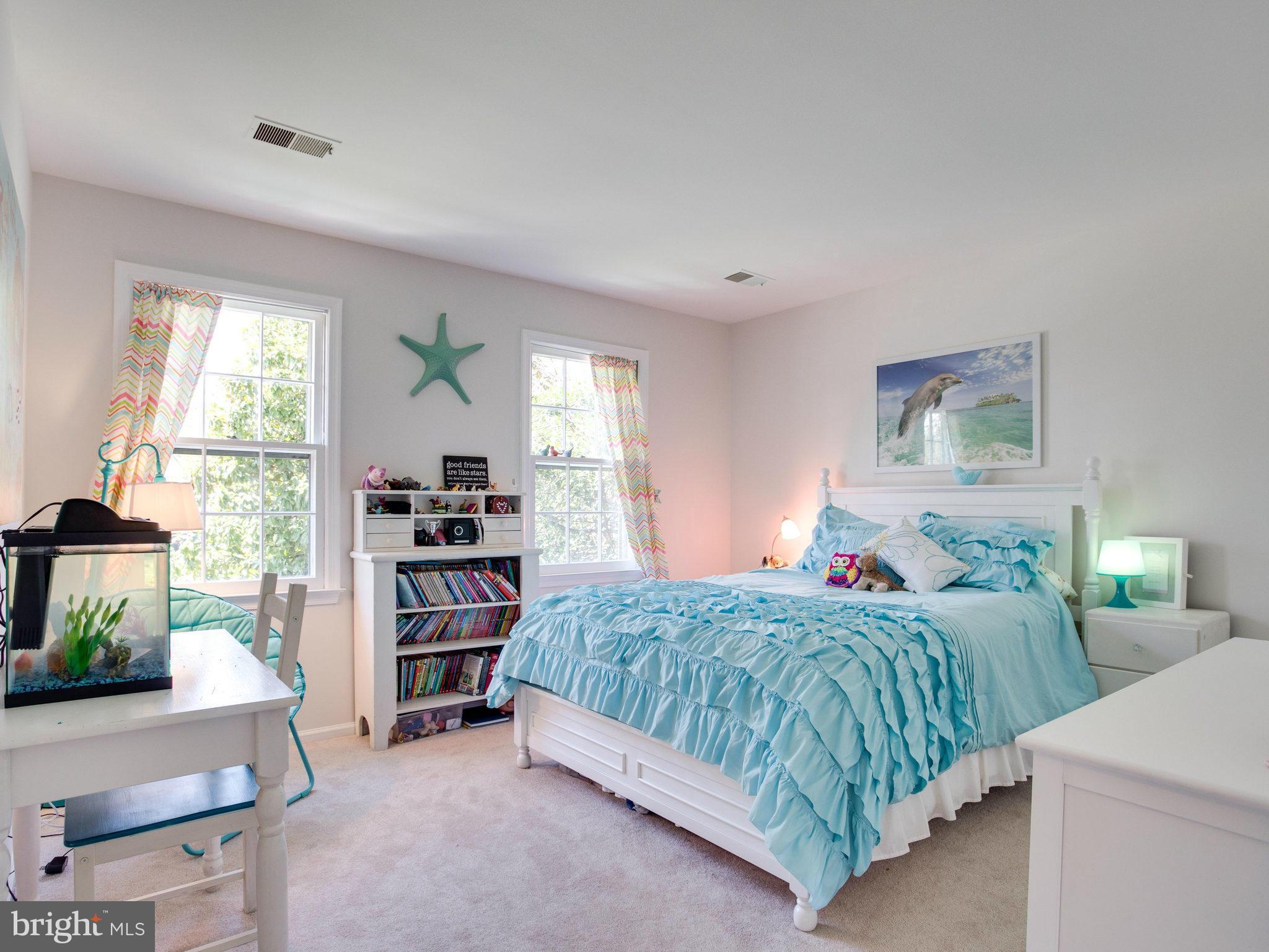 8231 Crown Court Road Alexandria, VA 22308 - Photo 24 of 30 a bedroom with a bed and a window