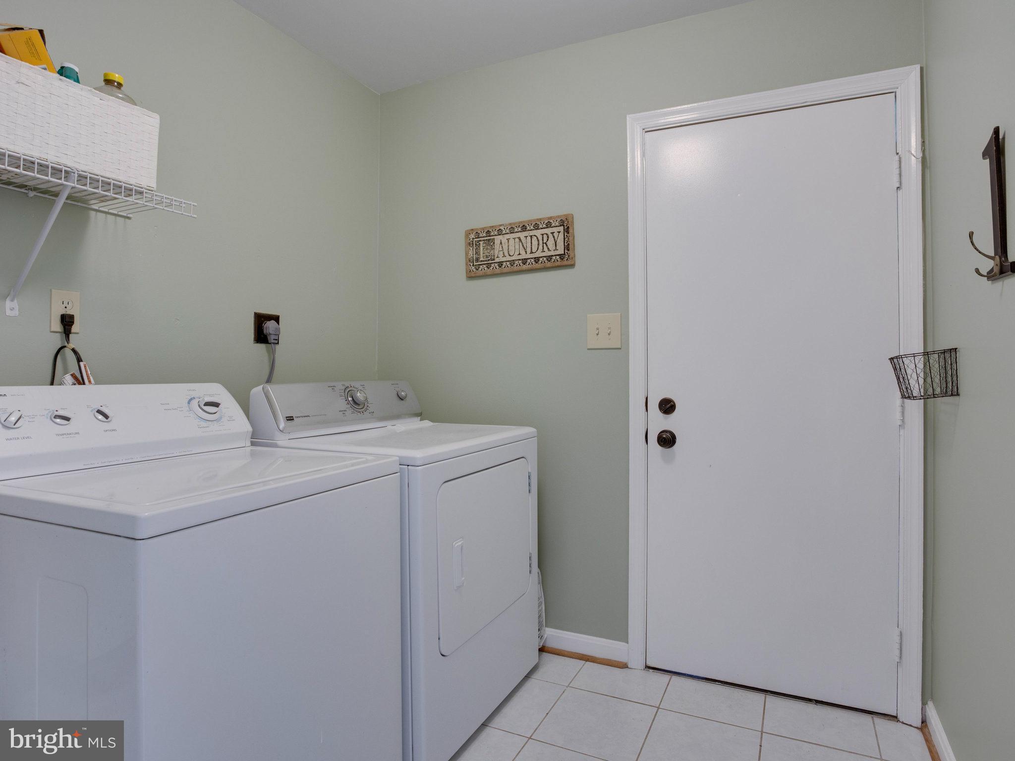 8231 Crown Court Road Alexandria, VA 22308 - Photo 27 of 30 a utility room with dryer and washer