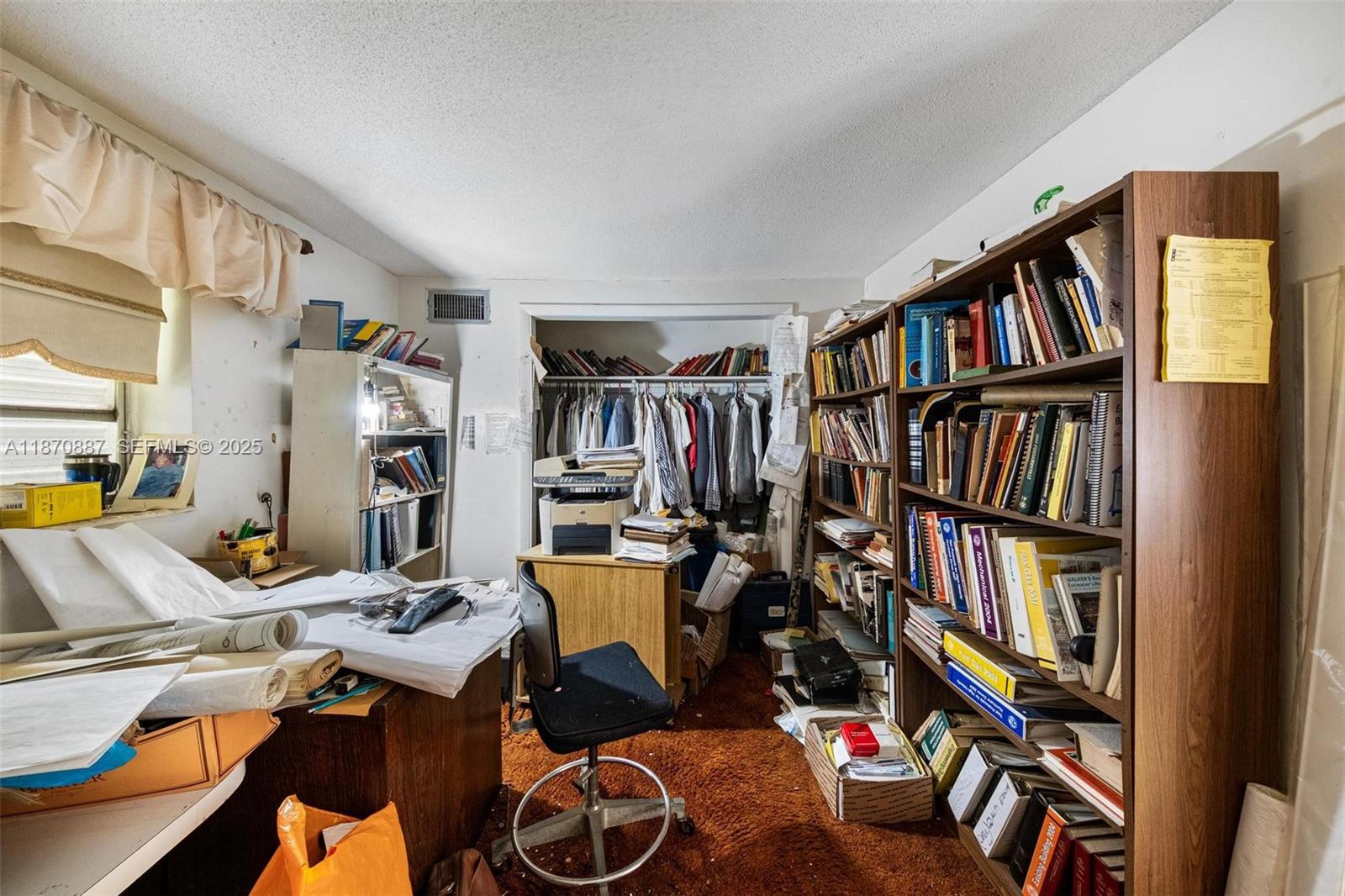 14150 Northwest 2nd Avenue Miami, FL 33168 - Photo 16 of 38 a view of a workspace with furniture