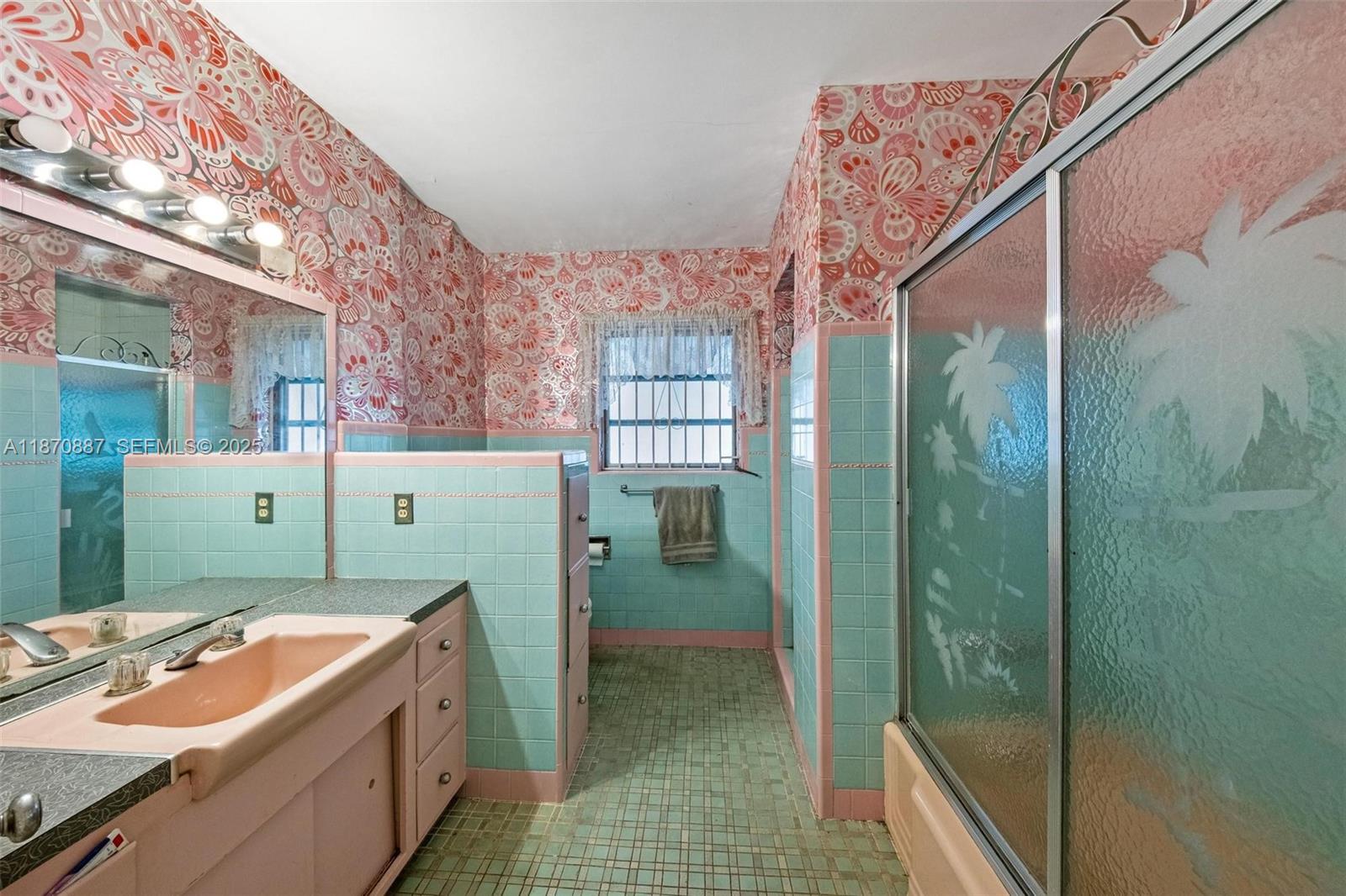 14150 Northwest 2nd Avenue Miami, FL 33168 - Photo 22 of 38 a bed room with a bed and a window