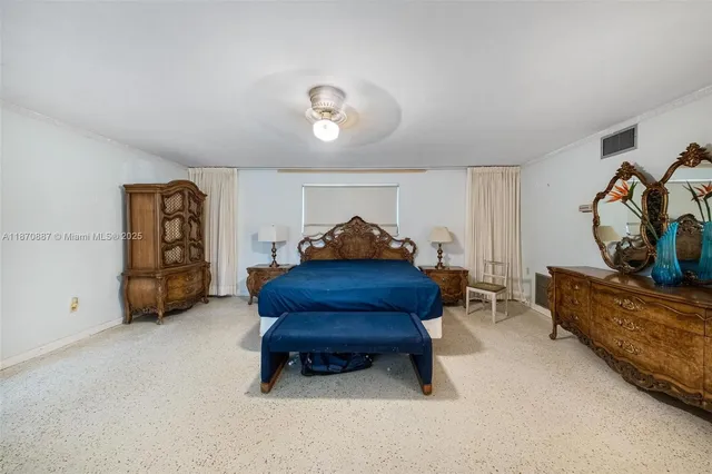 a bathroom with a granite countertop sink double vanity and a mirror