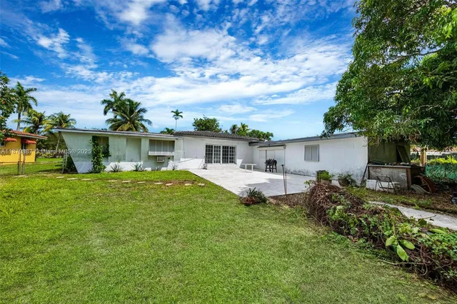 a house view with a garden space