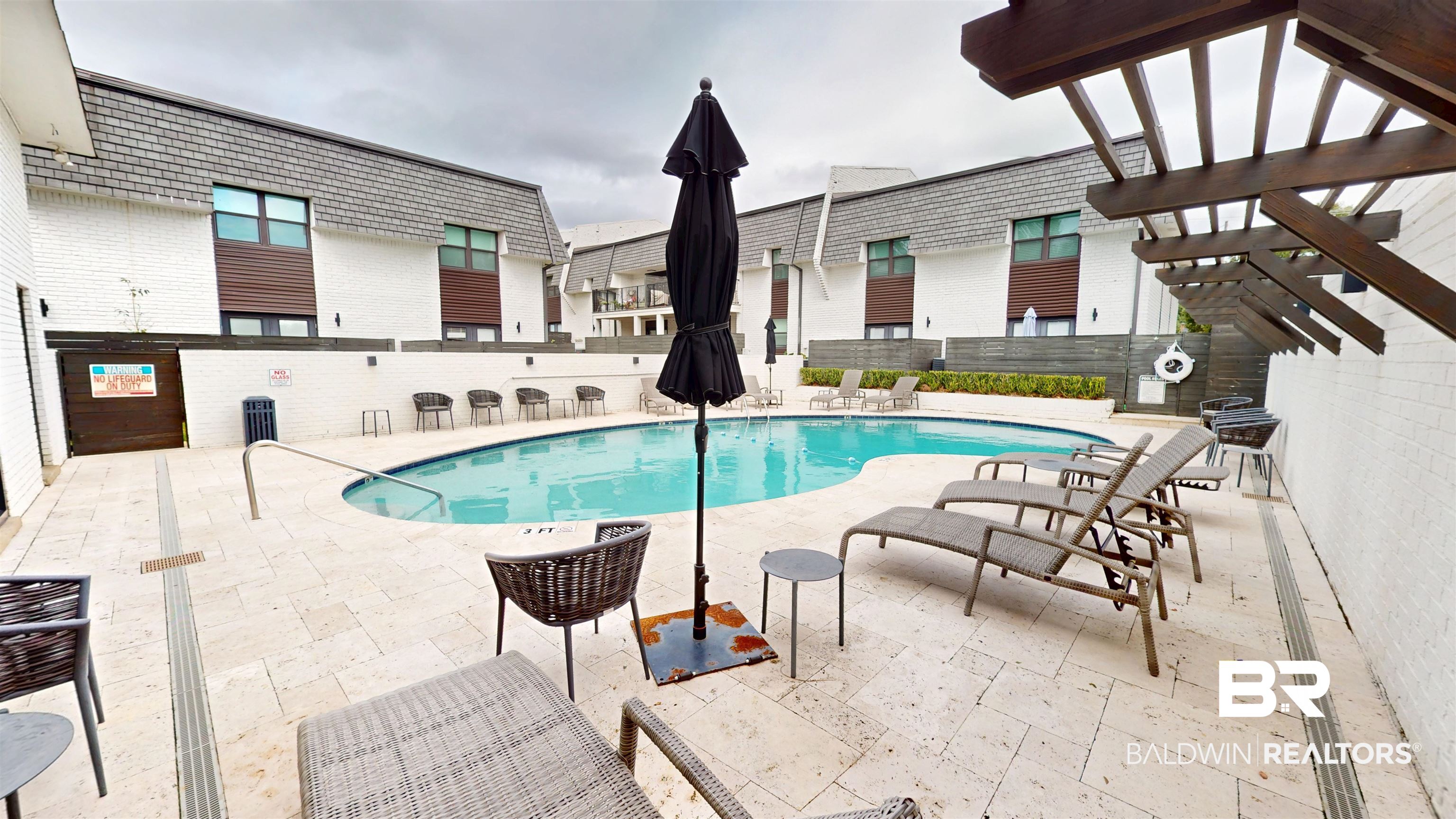 3655 Old Shell Road, Unit 219 Mobile, AL 36608 - Photo 16 of 25 Community pool featuring a patio