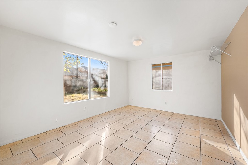 1252 East Ave R 6 Palmdale, CA 93550 - Photo 19 of 40 a view of an empty room and window