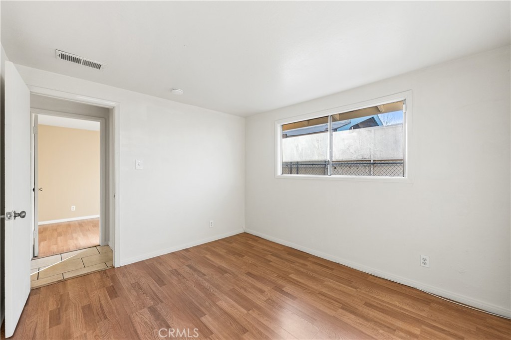 1252 East Ave R 6 Palmdale, CA 93550 - Photo 26 of 40 an empty room with a window