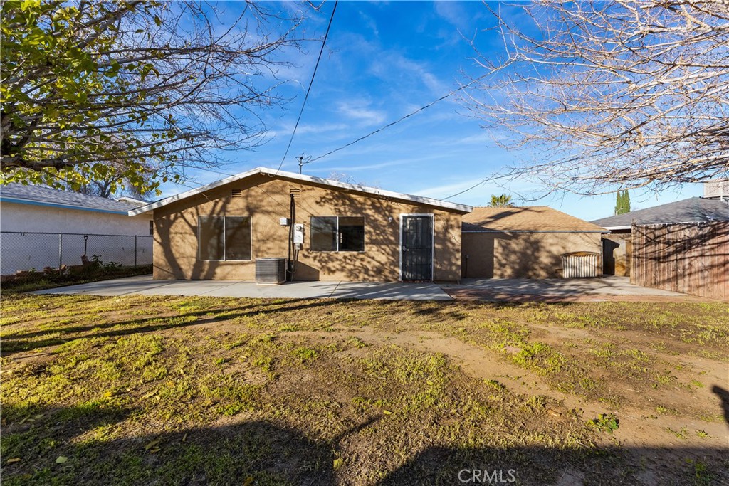 1252 East Ave R 6 Palmdale, CA 93550 - Photo 33 of 40 a view of a swimming pool with an outdoor space