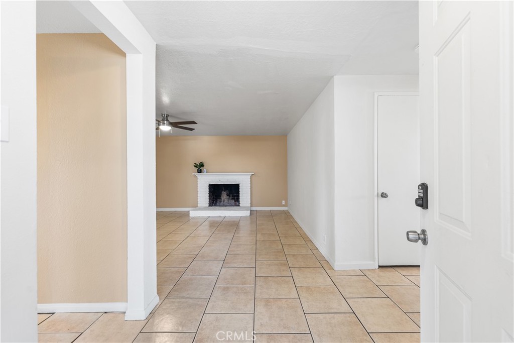 1252 East Ave R 6 Palmdale, CA 93550 - Photo 4 of 40 a view of a hallway with a hallway