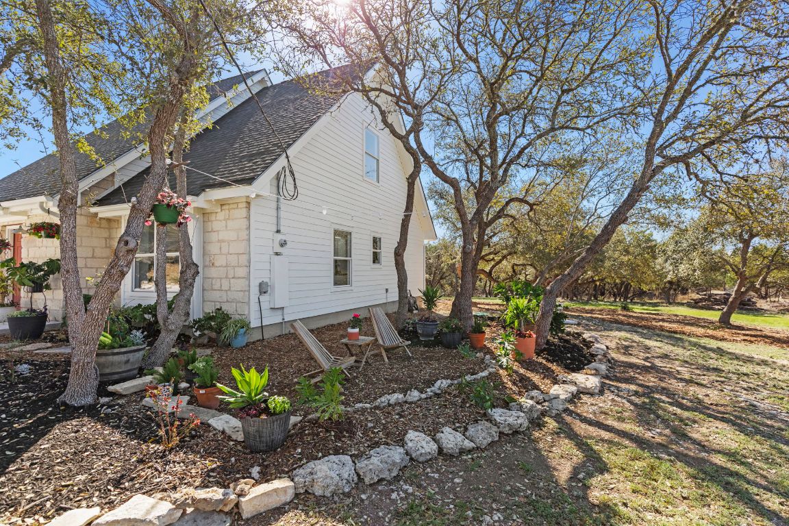 7197 Mt Sharp Road Wimberley, TX 78676 - Photo 33 of 39 a view of a yard with a house