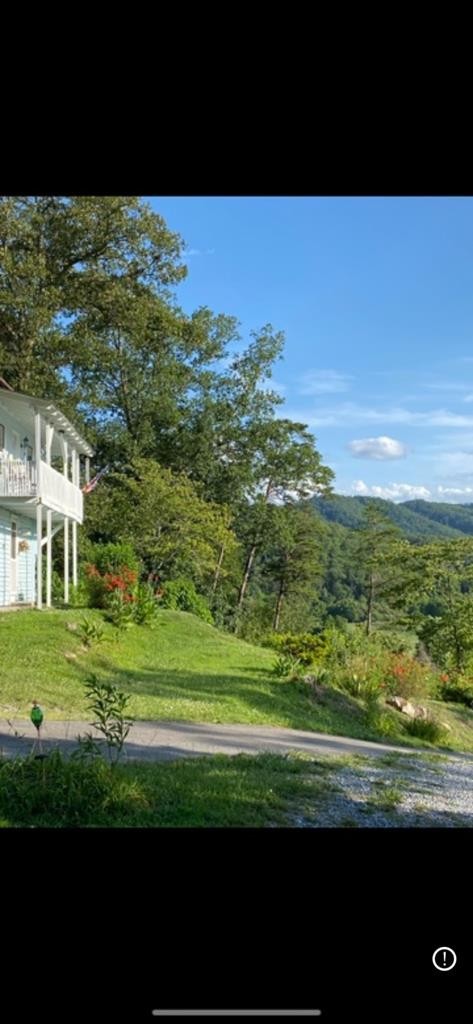 1174 Sharp Road Sevierville, TN 37876 - Photo 29 of 30 a view of a grassy area with an ocean
