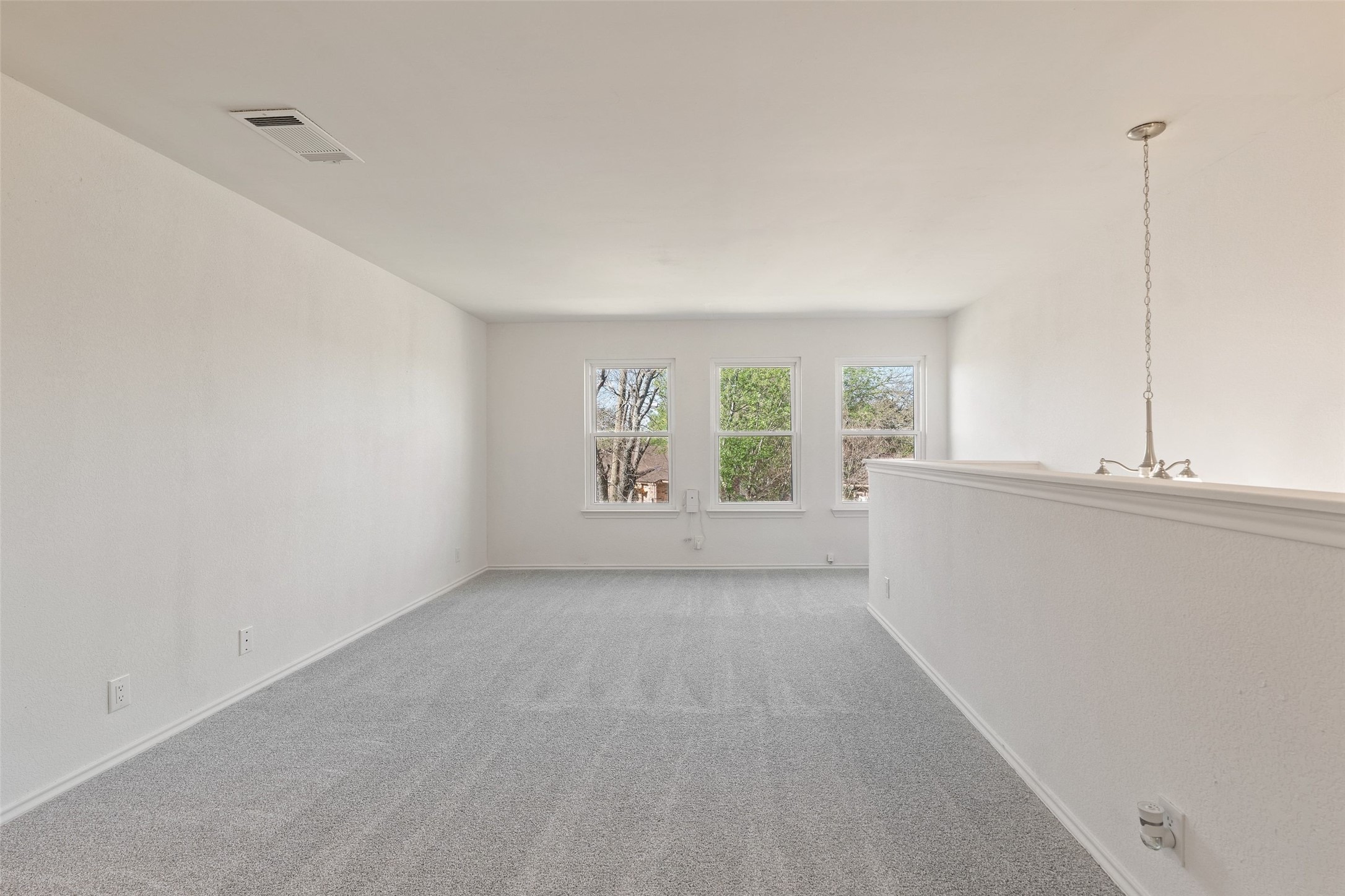 1011 Hayden Way Round Rock, TX 78664 - Photo 14 of 23 a view of an empty room with a window