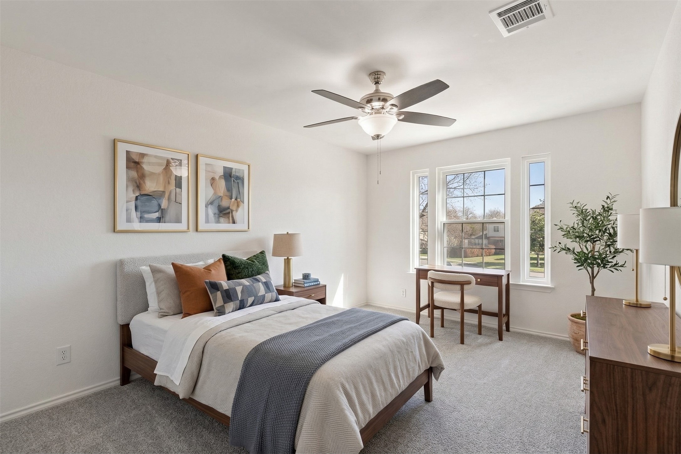 1011 Hayden Way Round Rock, TX 78664 - Photo 15 of 23 a bedroom with a large bed and a desk