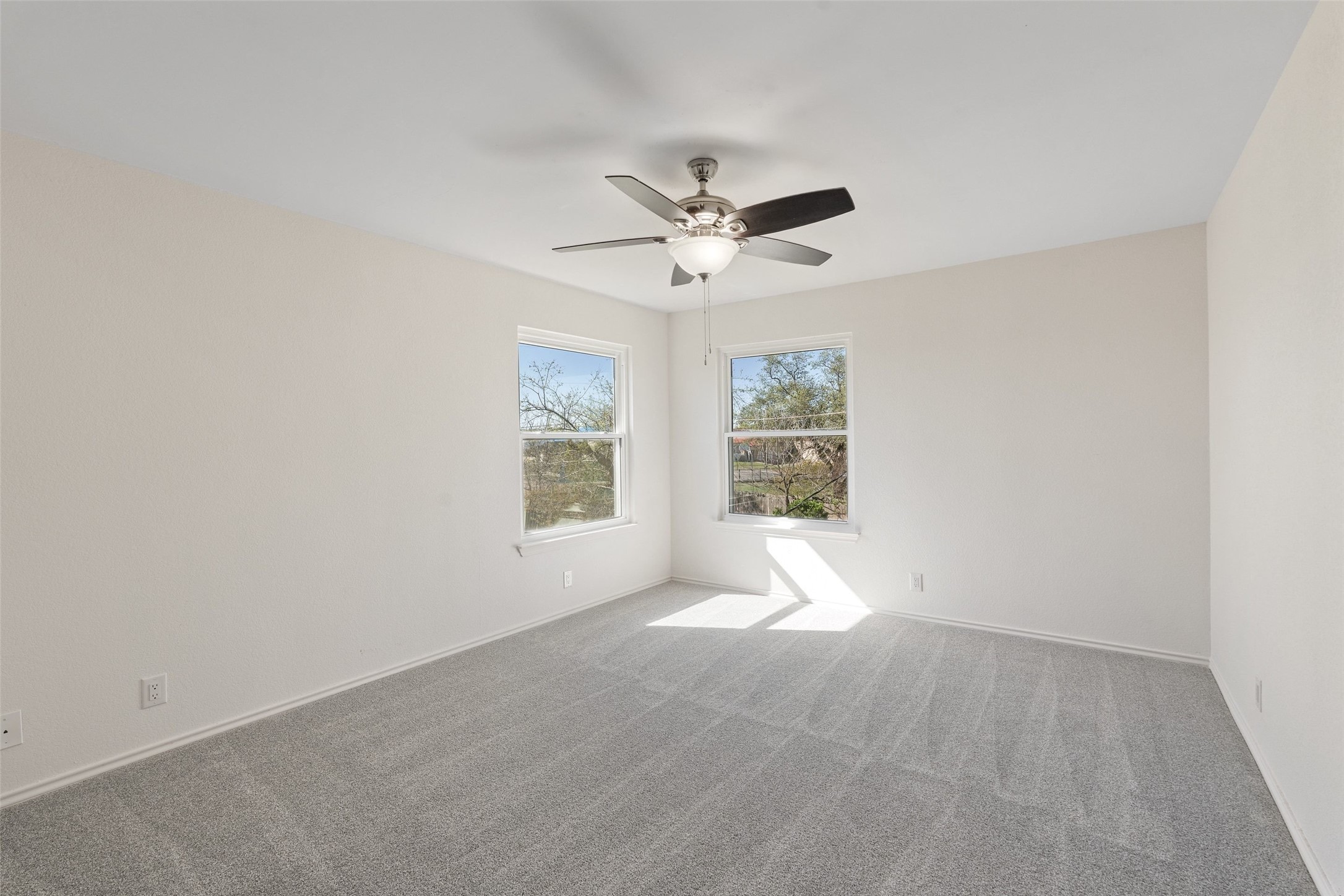 1011 Hayden Way Round Rock, TX 78664 - Photo 17 of 23 an empty room with a window and a fan