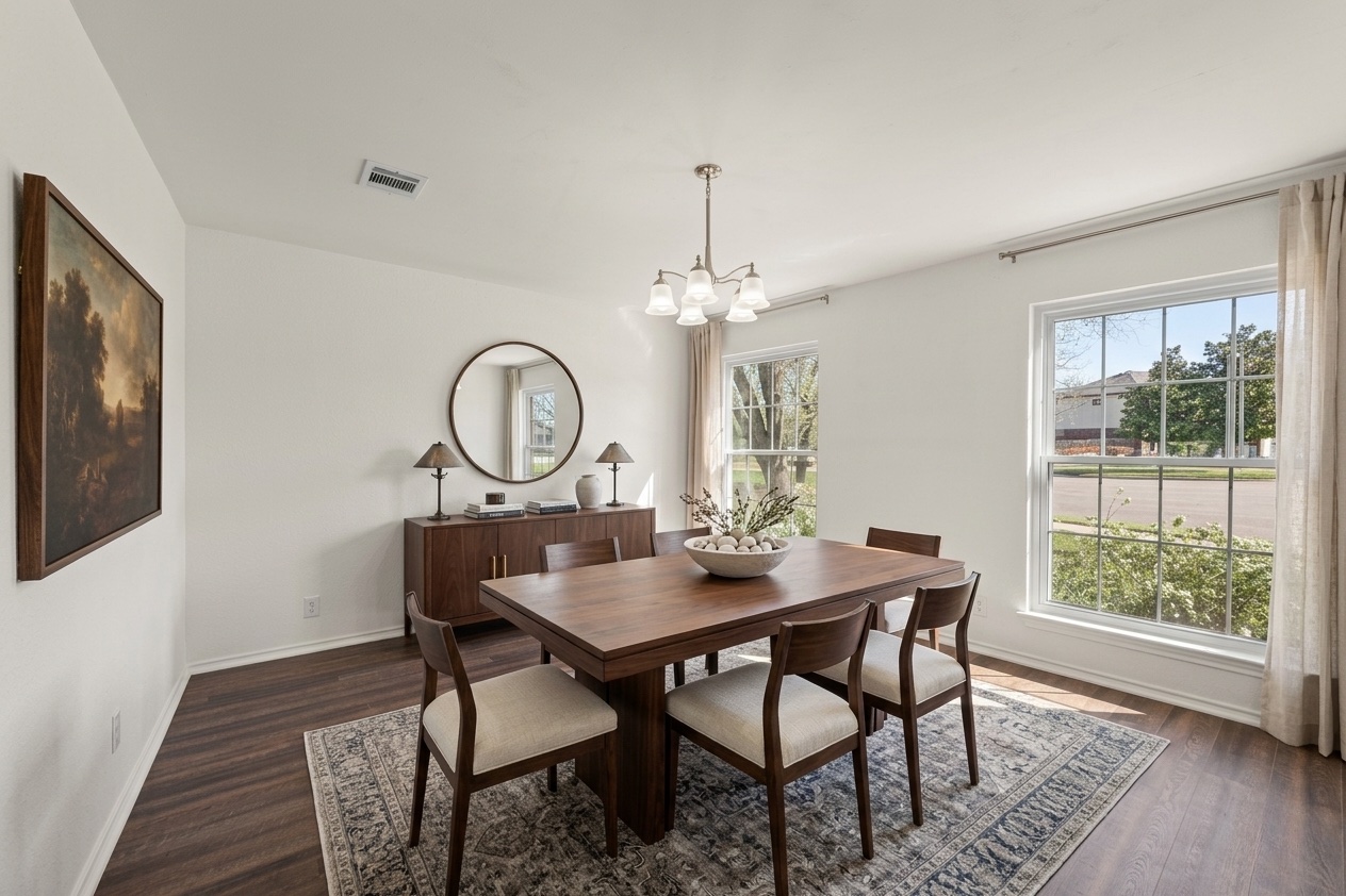 1011 Hayden Way Round Rock, TX 78664 - Photo 6 of 23 a view of a dining room with furniture window and wooden floor