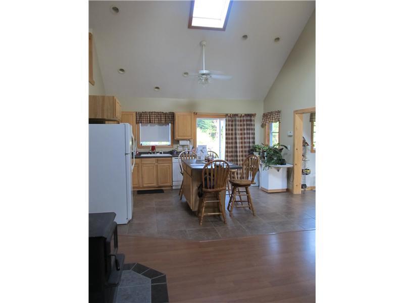 363 Pleasant View Ridge Road China, ME 04358 - Photo 9 of 35 Kitchen. Wood stove in the...