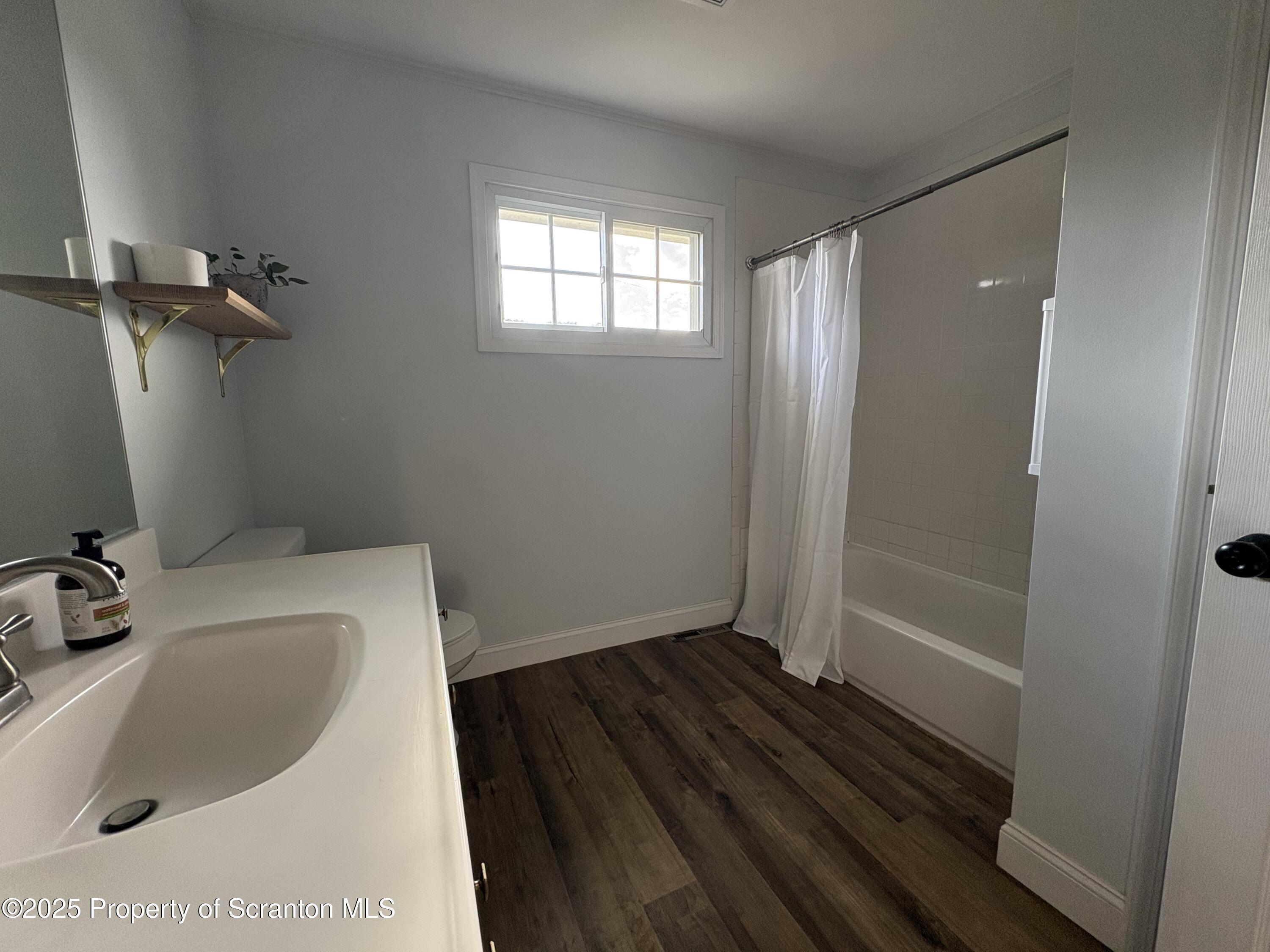 812 Old Winola Road Clarks Summit, PA 18411 - Photo 18 of 25 a bathroom with a sink and a tub