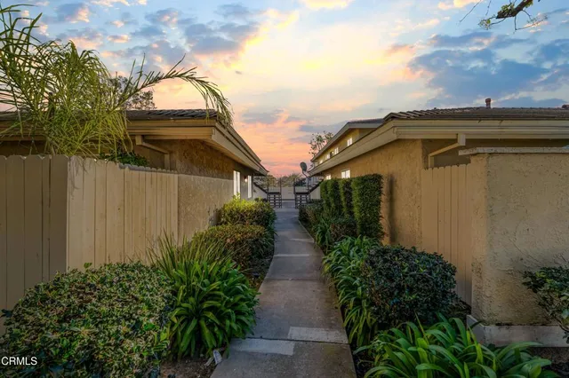 a house view with a backyard space
