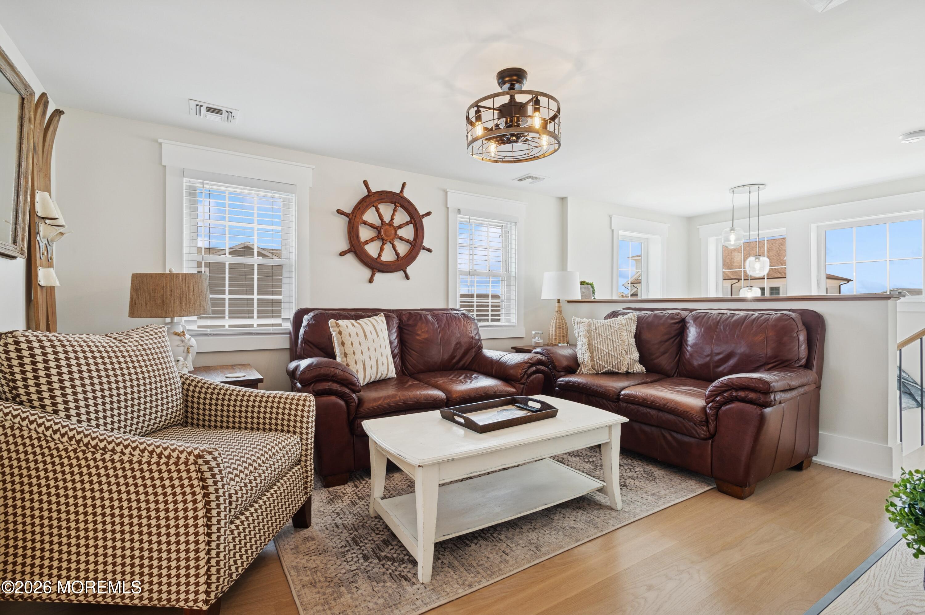 124 2nd Avenue Manasquan, NJ 08736 - Photo 15 of 38 a living room with furniture