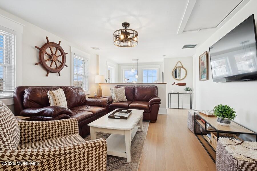 124 2nd Avenue Manasquan, NJ 08736 - Photo 16 of 38 a living room with furniture