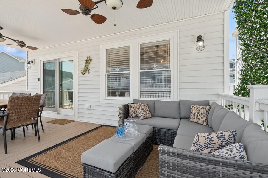 124 2nd Avenue Manasquan, NJ 08736 - Photo 33 of 38 a living room with furniture and wooden floor