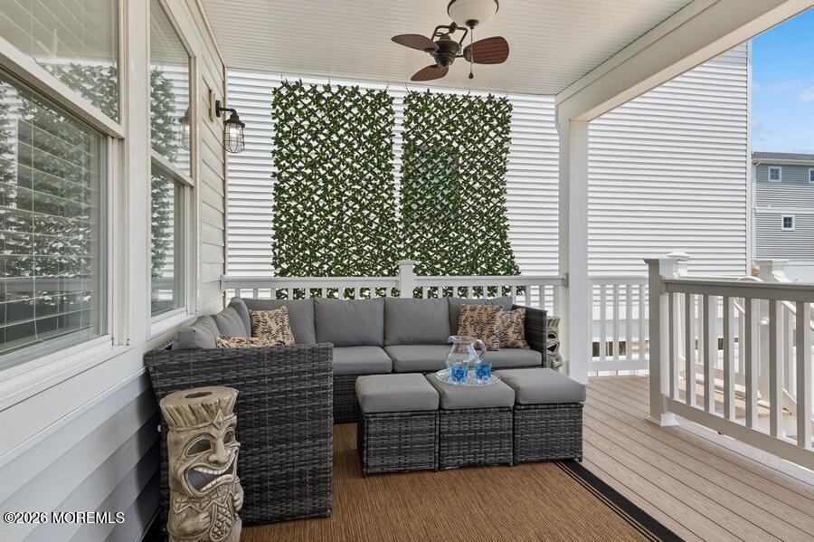 124 2nd Avenue Manasquan, NJ 08736 - Photo 34 of 38 a living room with furniture and a window