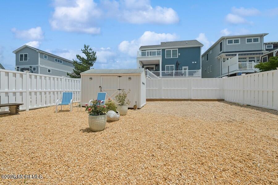 124 2nd Avenue Manasquan, NJ 08736 - Photo 36 of 38 a view of a house with backyard and sitting area