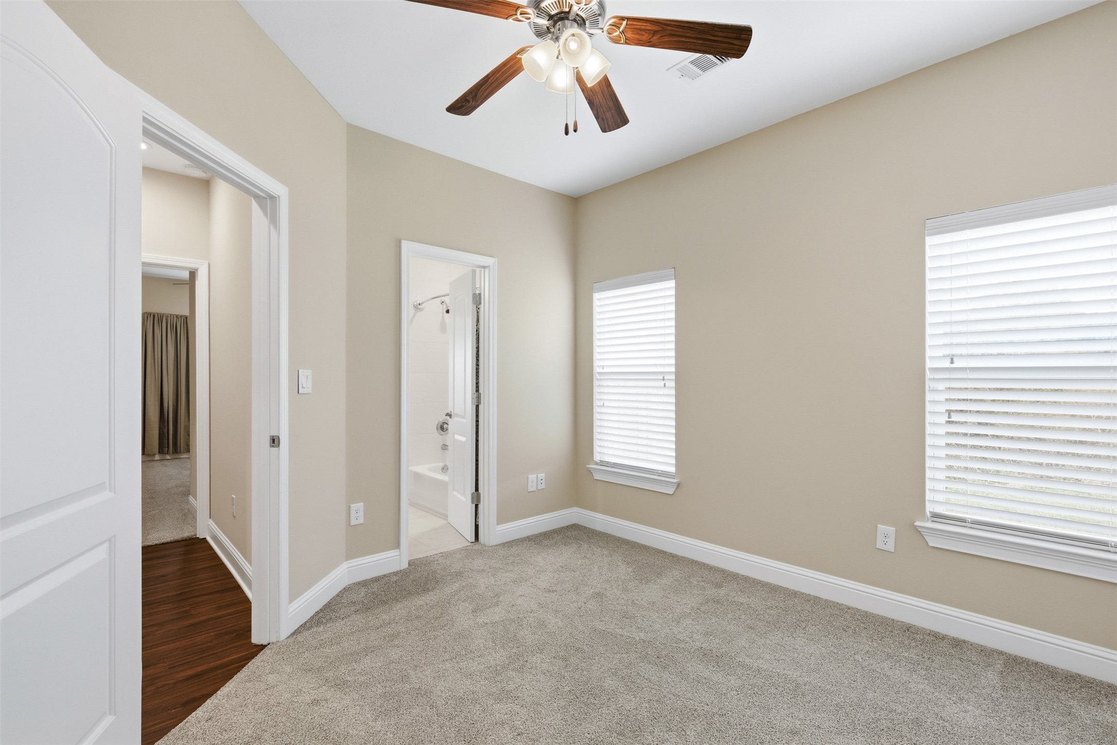 31602 Cypress Circle Waller, TX 77484 - Photo 21 of 32 a view of a livingroom with a ceiling fan and window