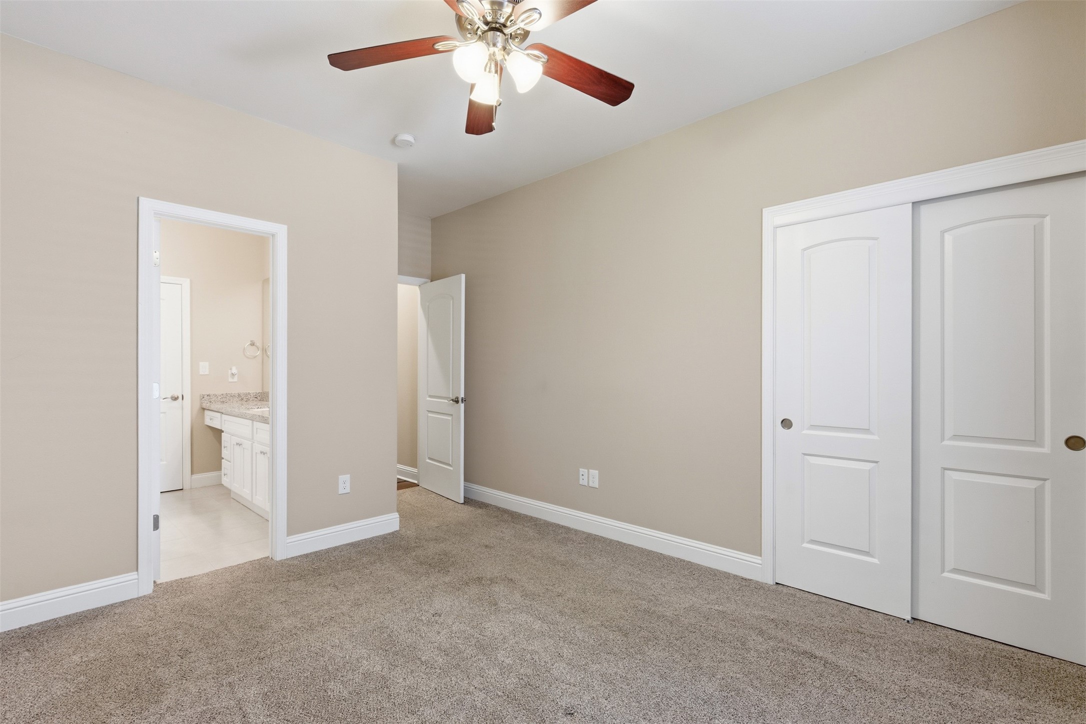 31602 Cypress Circle Waller, TX 77484 - Photo 24 of 32 an empty room with closet and a chandelier fan