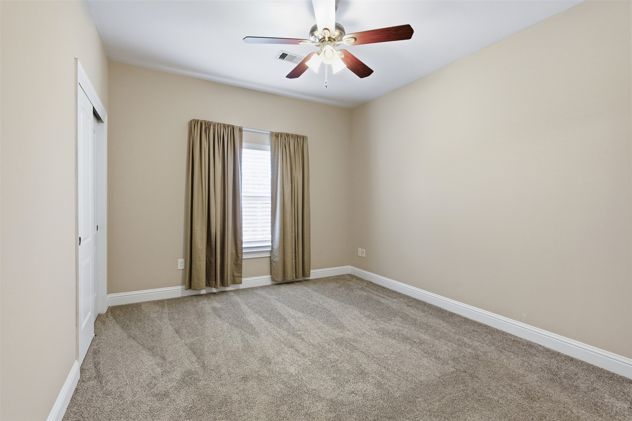 31602 Cypress Circle Waller, TX 77484 - Photo 25 of 32 a view of an empty room with a window