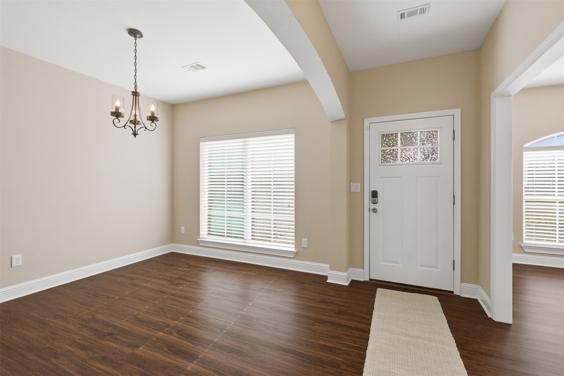 31602 Cypress Circle Waller, TX 77484 - Photo 4 of 32 an empty room with wooden floor and windows