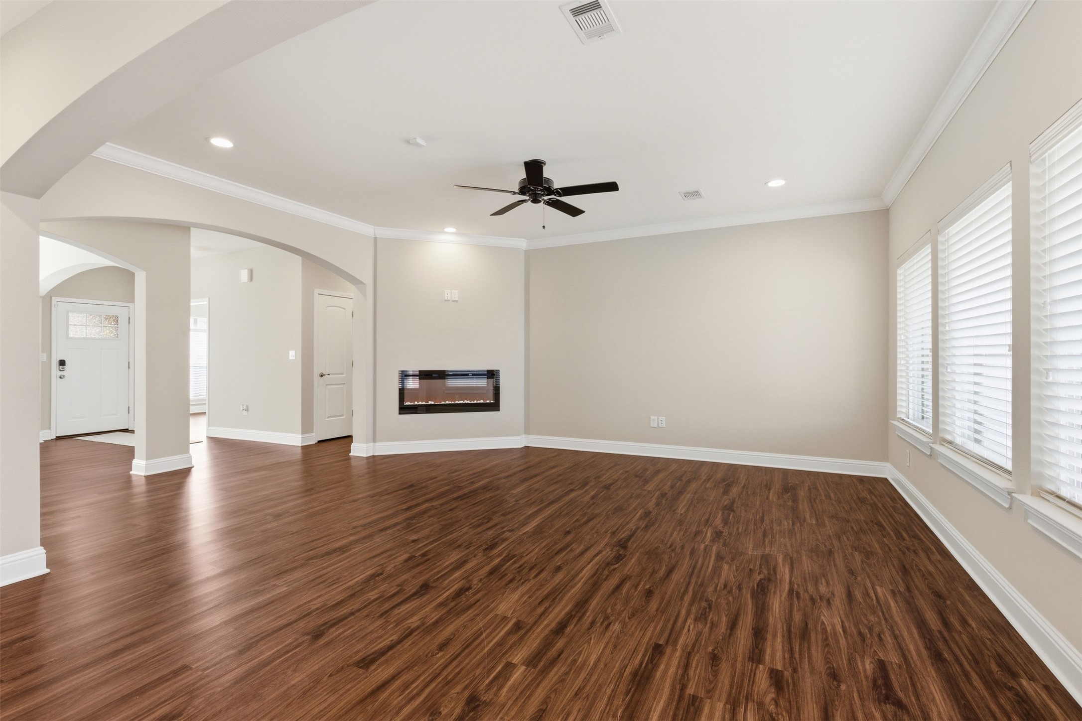 31602 Cypress Circle Waller, TX 77484 - Photo 9 of 32 wooden floor in an empty room with a window