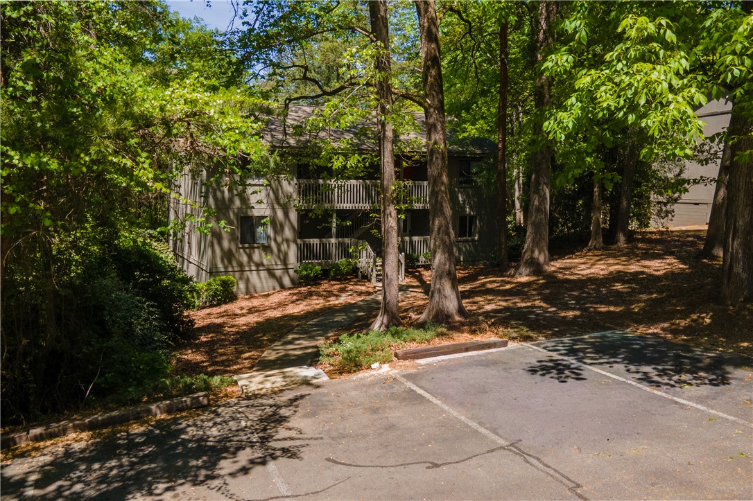 150 Ligon Street, Unit 2302 Clemson, SC 29631 - Photo 18 of 18 This charming residence is nestled among mature trees, offering tranquil living and convenient parking.