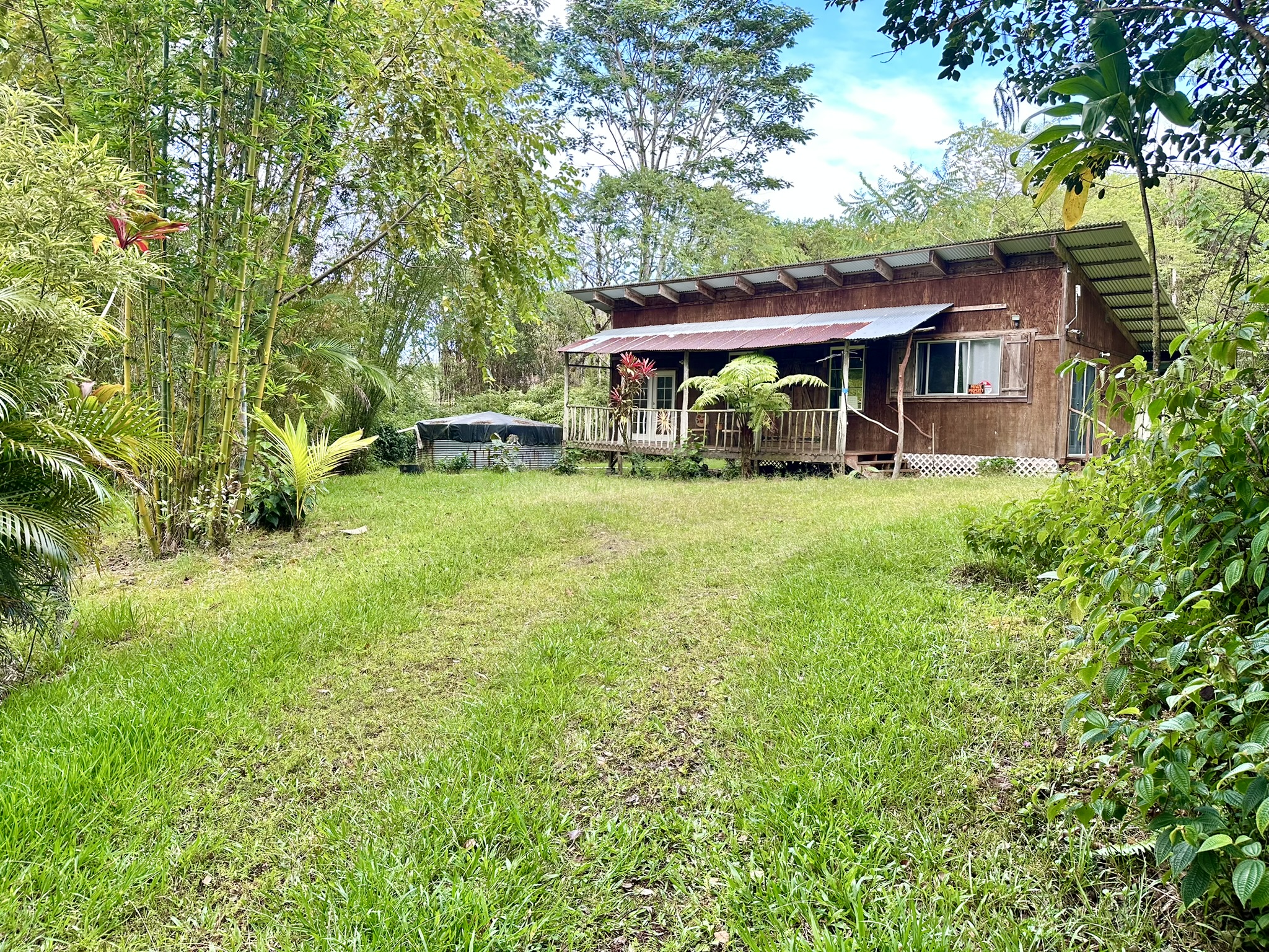 front view of a house with a yard