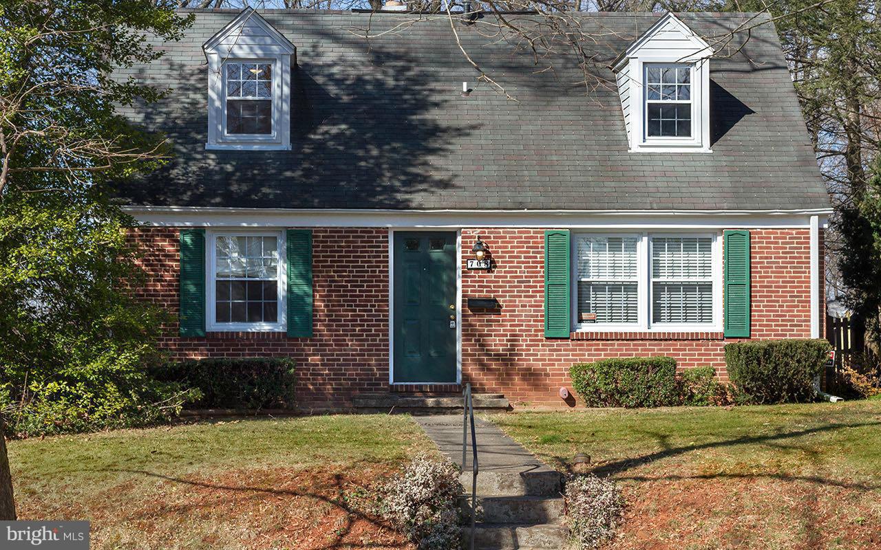 708 Sudbrook Road Pikesville, MD 21208 - Photo 1 of 30 front view of a house with a yard