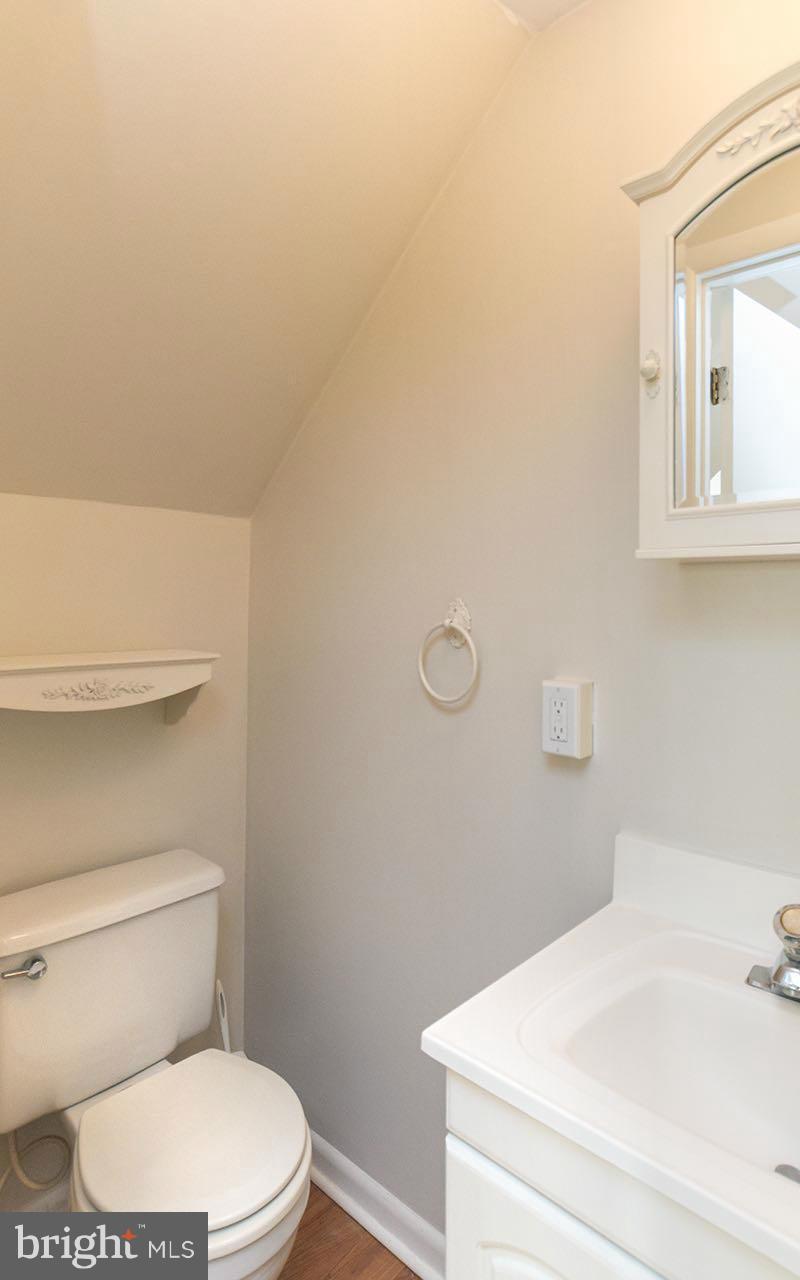 708 Sudbrook Road Pikesville, MD 21208 - Photo 8 of 30 a bathroom with a toilet and a sink