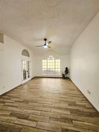 a view of an empty room and window