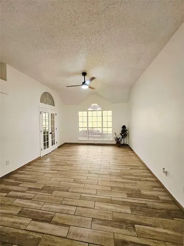 a view of an empty room and window