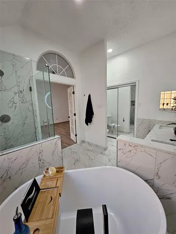 a living room with couches and painted walls